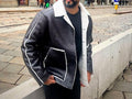 Leather jacket with white fur lining