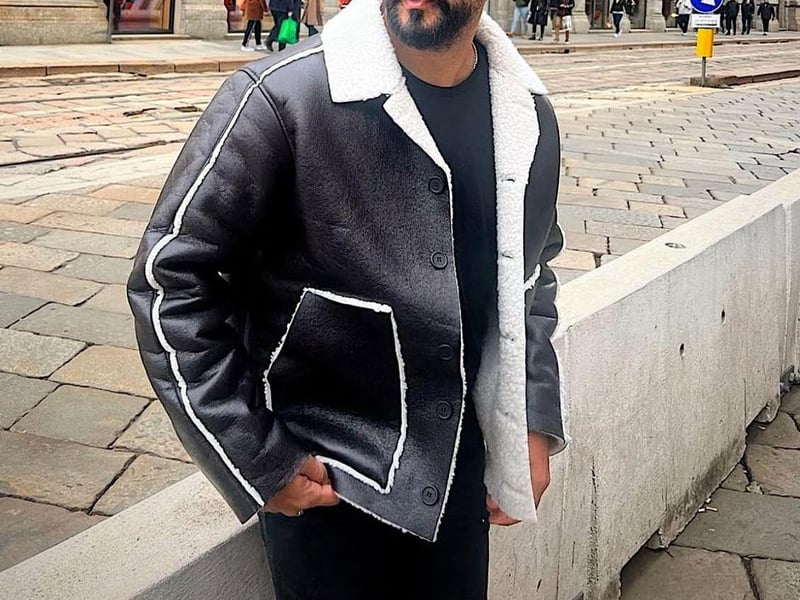 Leather jacket with white fur lining